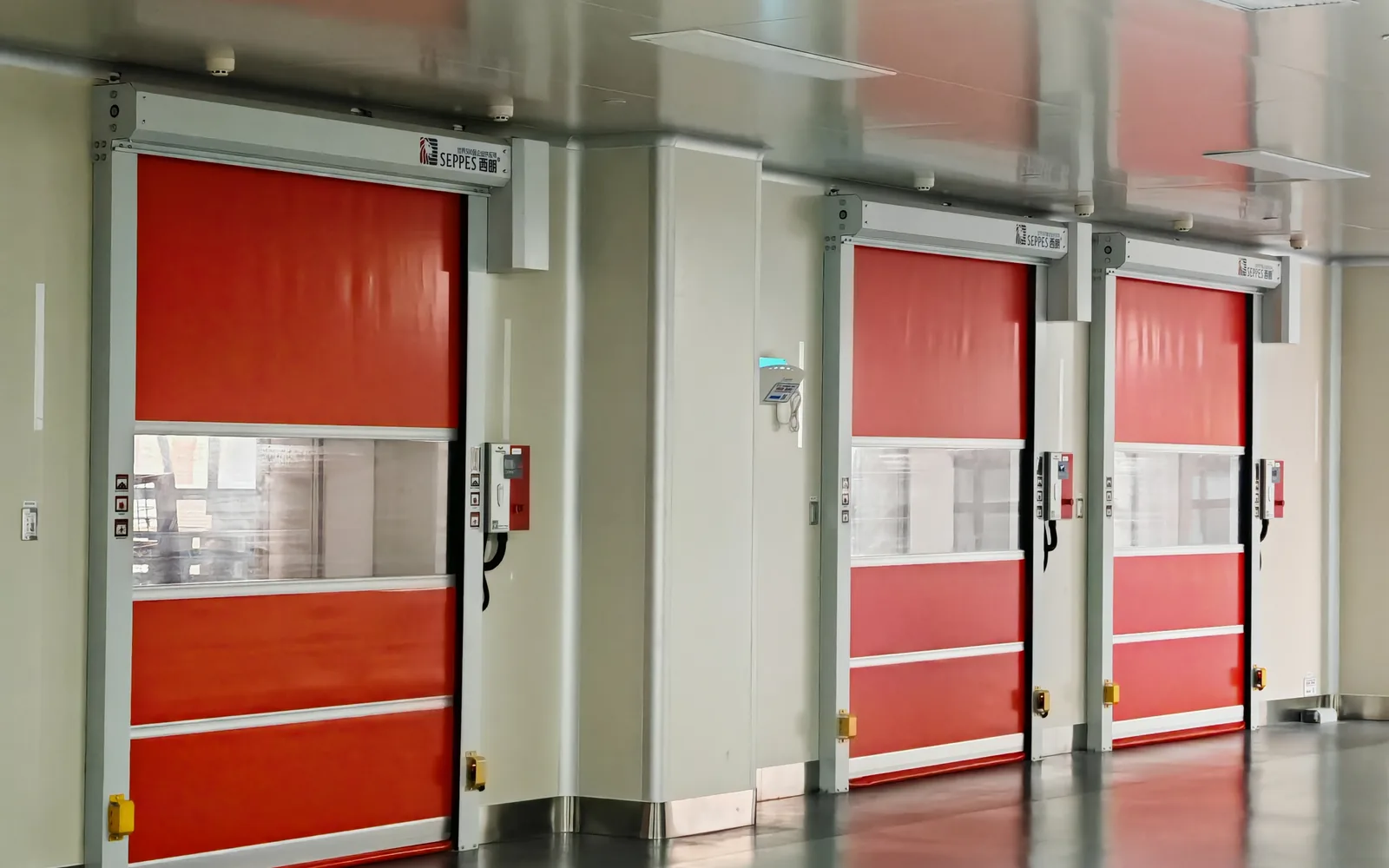 Two SEPPES rapid doors installed along a controlled pharmaceutical corridor