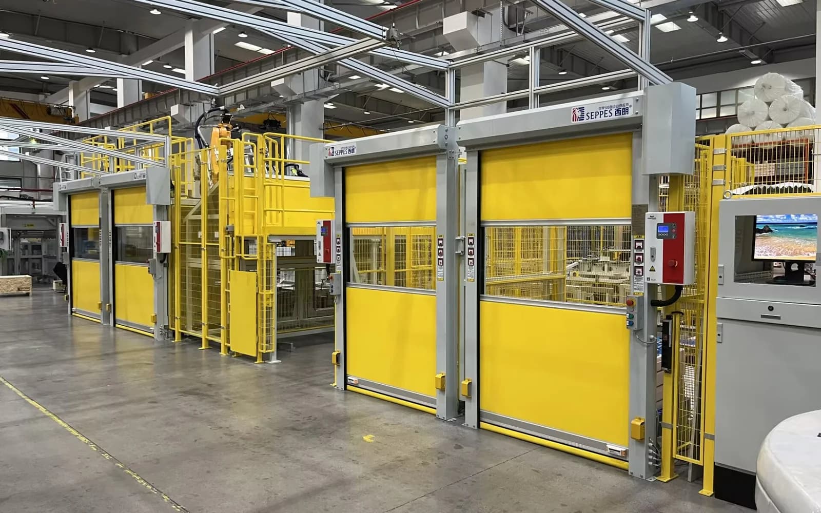 SEPPES high-speed doors installed along a busy production route